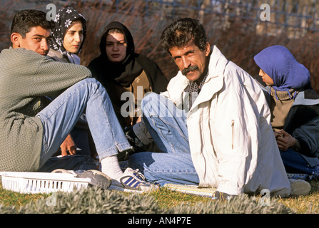 Family spending day out in countryside, Tehran, Iran Stock Photo