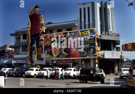 A big billboard advertize a local movie in downtown Bangalore India Stock Photo