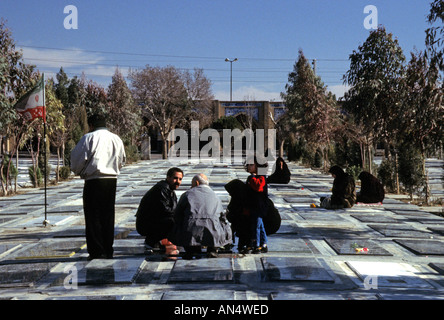 Family at Iran Iraq war cemetery, Tehran Stock Photo