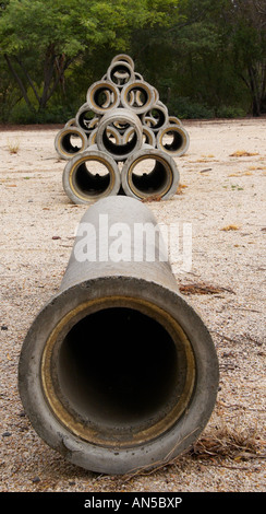 Concrete pipes stacked in patterns. Stock Photo