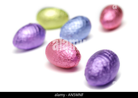 Foil covered easter eggs on white background Stock Photo