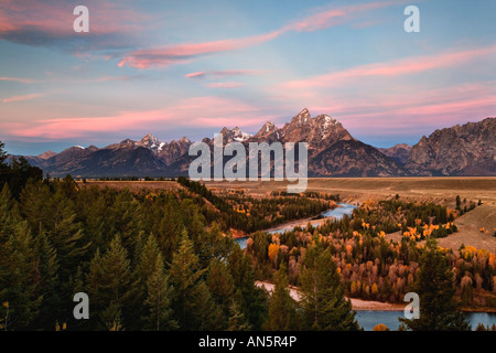 Grand Teton sunrise reflected in Snake river Stock Photo