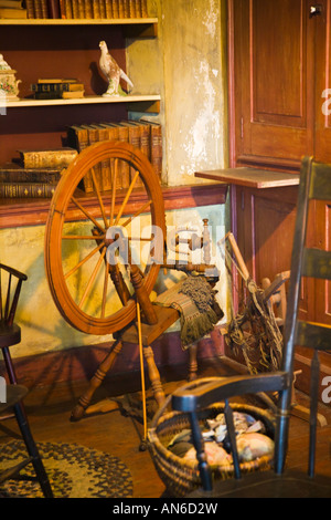 ILLINOIS Galena Dowling House oldest house in Galena built 1826 spinning wheel in corner rocking chair Stock Photo