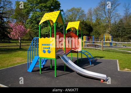 East Grinstead, West Sussex, England. Colourful climbing frame in children's playground. Stock Photo