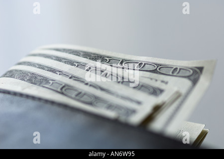 US dollar notes coming out of a wallet Stock Photo