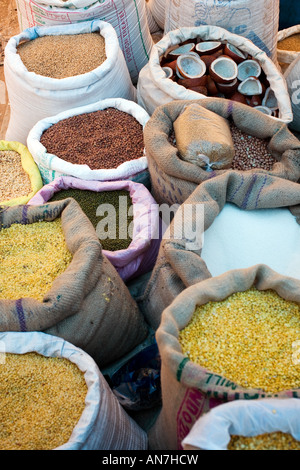 Sacks of wholesale indian goods at the market. Puttaparthi, Andhra Pradesh, India Stock Photo