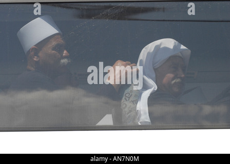 Members of the Druze community sit in a bus crossing the Israeli border into Syria, Golan Heights, Israel Stock Photo