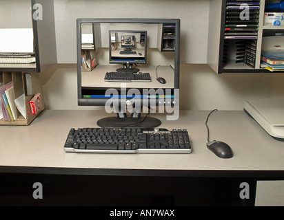 Portrait of a personal computer or PC complete with mouse and keyboard in a home office setting Stock Photo