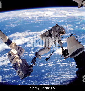 STS112 709 073K 10 October 2002 Astronaut David A Wolf STS 112 mission specialist anchored to a foot restraint Stock Photo