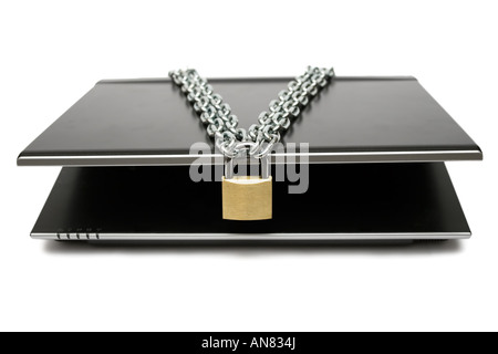 Padlock and chain locking a notebook. White background. Stock Photo