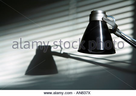 Desk lamp and shadow Stock Photo