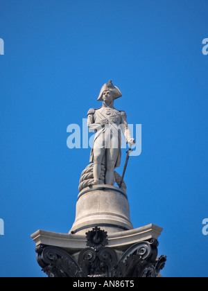 The recently cleaned statue of Admiral Nelson on top of Nelsons Column Trafalgar Square Westminster London GB. Stock Photo