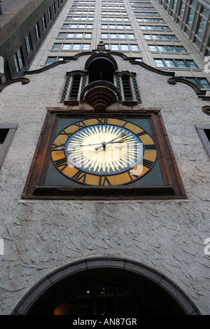The watch on the outside building facade next to the Oriental Theater in the Theater District in downtown Chicago Illinois USA Stock Photo