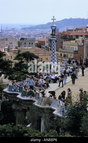 Many visitors at Square benches at Guell Park by Antonio Gaudi Barcelona Catalonia Spain Stock Photo