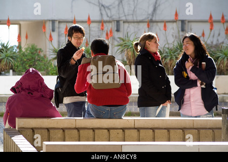 COIMBRA PORTUGAL Students at University of Coimbra take break between classes Note different ethnicities of students Stock Photo