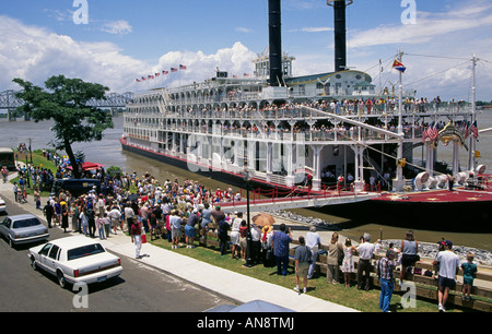 A portrait of the American Queen the largest paddlewheel steamboat in the world on the Mississippi River docked at Natchez Stock Photo