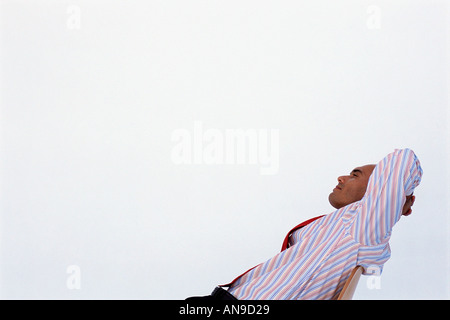 Satisfied businessman relaxing Stock Photo