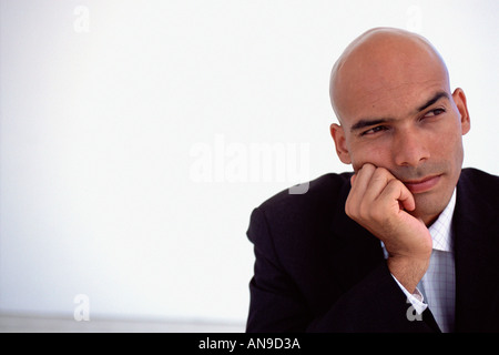 Businessman deep in thought Stock Photo