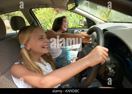 Girls having fun in car