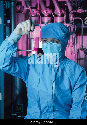 Woman researcher holding test tubes with blood Stock Photo