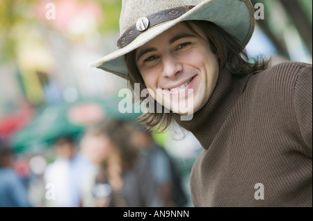 Hispanic man wearing cowboy hat Stock Photo