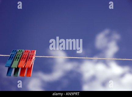 Plastic Clothes Pegs on a Washing Line Stock Photo