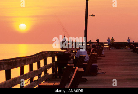 Fishermen on Nags Head fishing pier Outer Banks North Carolina USA Stock Photo