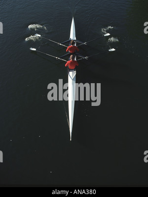 power and teamwork at speed rowing on the river Thames in London england popular with fitness fanatics Stock Photo