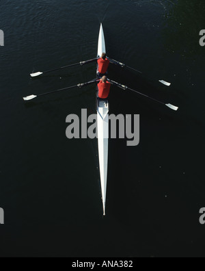 teamwork at speed rowing on the river thames Stock Photo