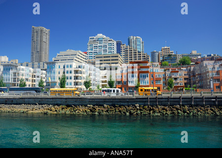 Residential high rises and houses at the harbor promenade overlooking the piers in Seattle Washington USA Stock Photo