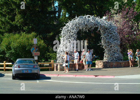 Mazda RX8 Sports Car Parked near Arch of Elk Antlers by Central Park in Jackson Wyoming USA Stock Photo