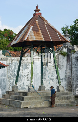Palace Guard Sounding the Bell Kraton or Sultan Palace Yogyakarta Java Indonesia Stock Photo