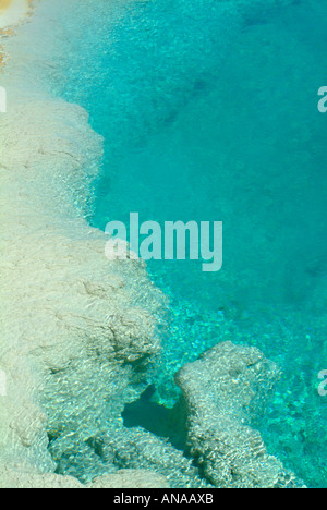 Closeup of the Beautiful Blue Water of The Black Pool Spring at West Thumb Geyser Basin in Yellowstone National Park Wyoming USA Stock Photo