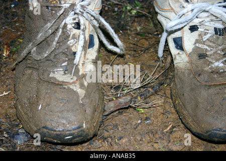 muddy and worn sneakers after a hike in New Zealand Stock Photo