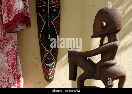 Miami Beach Florida,6th Sixth Street,boutique shop,consumer,African art artwork,face mask,wood statue,dress,visitors travel traveling tour tourist tou Stock Photo