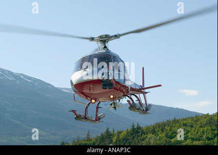 Helicopter taking off Skagway Alaska USA Stock Photo