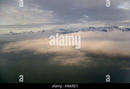 Early morning view of mountains and clouds from a light aircraft nr Haines Alaska USA Stock Photo