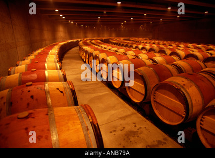 CA Napa Valley Barrels of aging wine in cellar Stock Photo