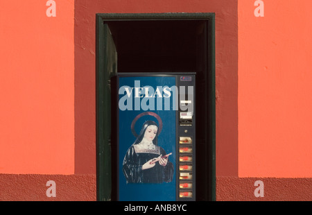 Candle (vela in Spanish) vending machine outside church on Gran Canaria in the canary islands Stock Photo