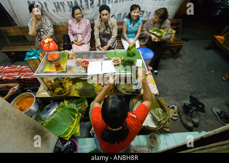 Women Enjoying Food at a Local Restaurant Solo Java Indonesia Stock Photo