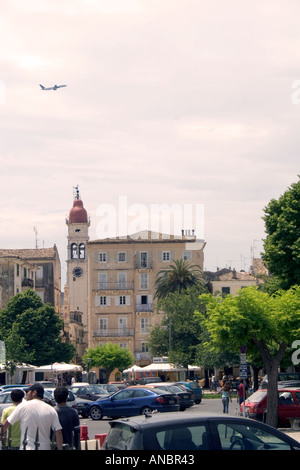 airplane flying low over church of saint Agios Spyridonas, Kerkyra, Corfu, Greece, Stock Photo