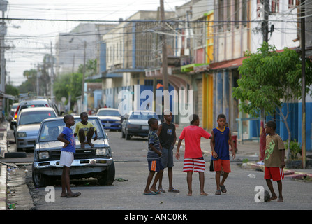 Kingston, Jamaica: children playing soccer in downtown Kingston Stock Photo