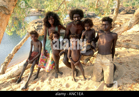 Aborigines Marina Murdilnga and Billy Nalakandi with their children at their outstation camp at Kubumi in remote Arnhem land Stock Photo