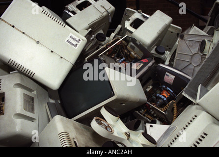 computers redundant rubbish technology outdated trash in dump skip Stock Photo
