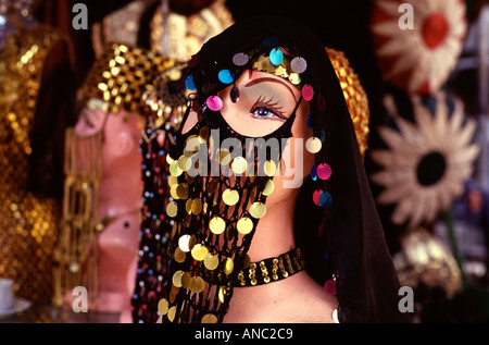 Burka headdress decorated with metal coins for sale at a souvenir stall in Khan el Khalili Bazaar in the Old city of Cairo Egypt Stock Photo