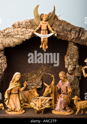 Detail of a small Christmas Neapolitan Nativity scene for domestic decoration showing the Virgin Mary Baby Jesus and Joseph Stock Photo