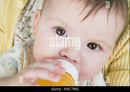 1, one, Hispanic girl, baby girl drinking from baby bottle, toddler, Castro  Valley, Alameda County, California, United States, North America Stock  Photo - Alamy