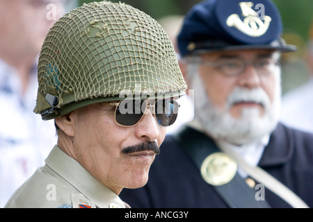Reenactors in US World War Two and civil war army uniforms at US Memorial Day celebration Stock Photo