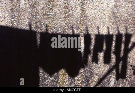 shadow of washing line on wall number 2253 Stock Photo