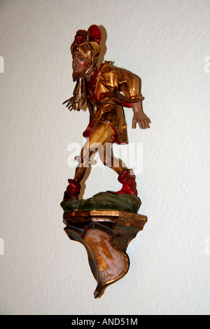 Moorish dancer figurine called 'The Sorcerer' on a wall Bavaria Germany Europe Stock Photo